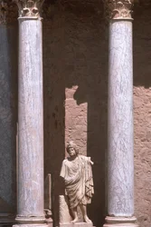 A statue between two columns